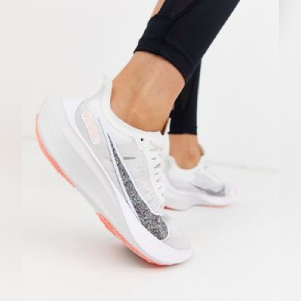 Nike Women's White Sneakers with Silver Glitter Swoosh and Coral Accents